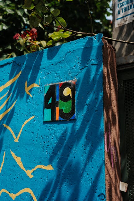 Assorted soft plush toys and artisan dolls on display